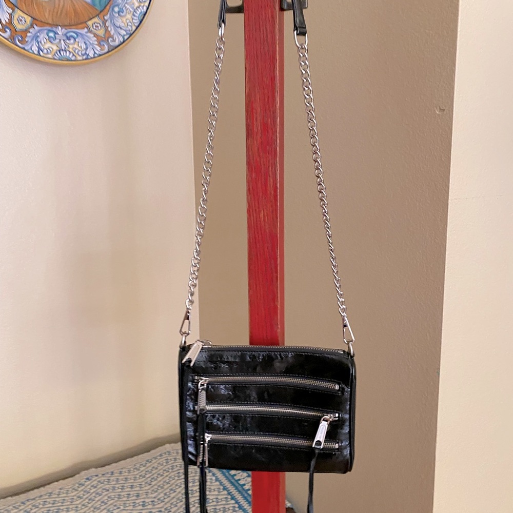 Rebecca Minkoff black patent leather crossbody bag.
